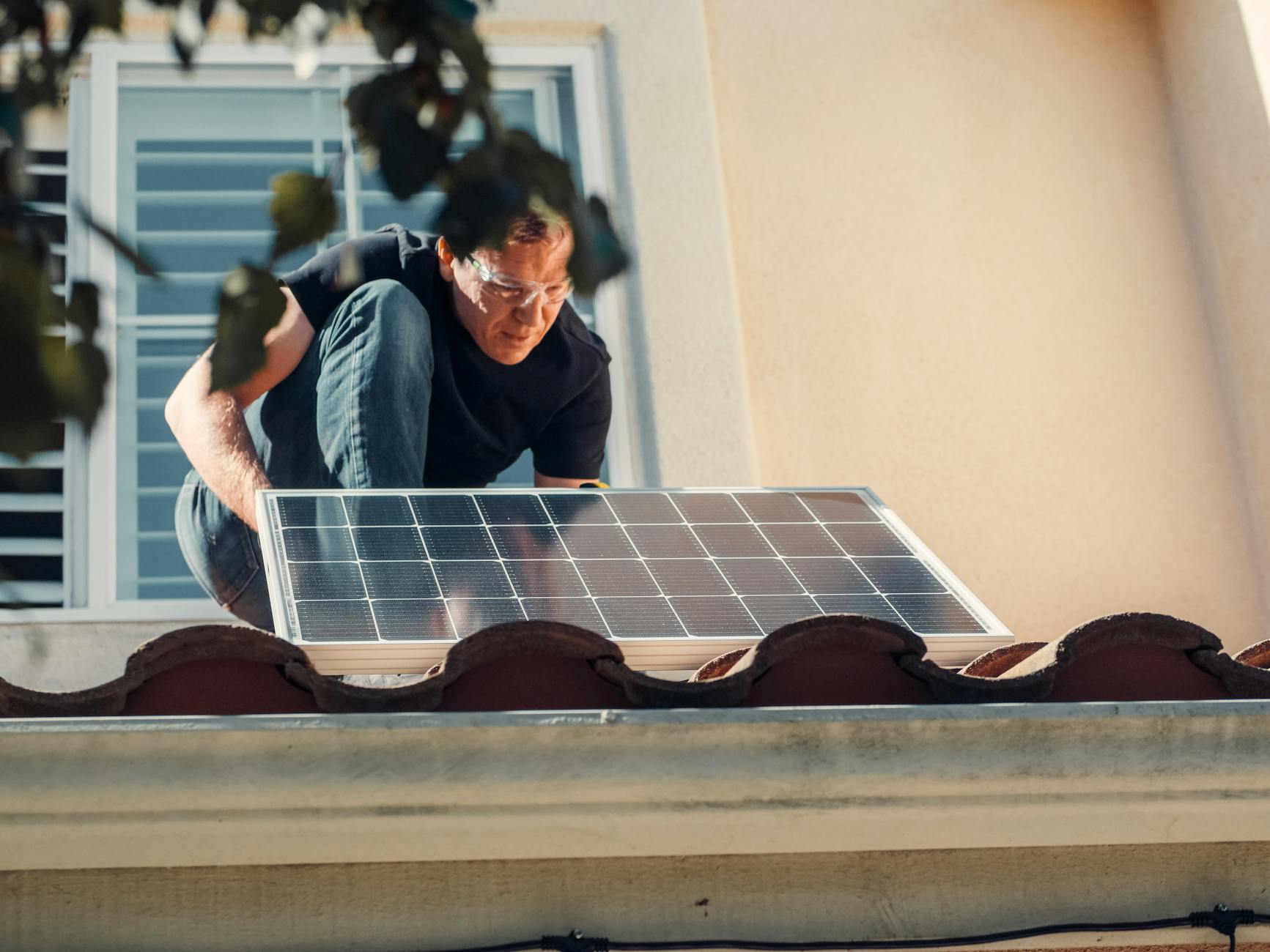 A professional roofing crew installing high-quality shingles on a residential roof in Riverton, Utah